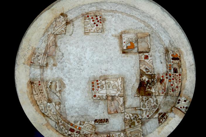 Image of an engraved disc depicting a royal procession, from the Ai Khanum Palac